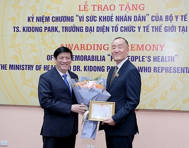 WHO Representative Honoured With Insignia WHO Representative Honoured With Insignia