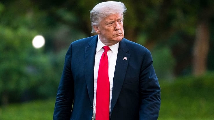 President Donald Trump walks to the White House residence after exiting Marine One on the South Lawn on June 25, 2020 in Washington, DC. Drew Angerer | Getty Images 5816 trump 2