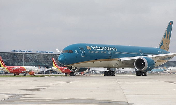 A Vietnam Airlines aircraft seen at Noi Bai International Airport in Hanoi. Photo: VnExpress A Vietnam Airlines aircraft seen at Noi Bai International Airport in Hanoi. Photo: VnExpress