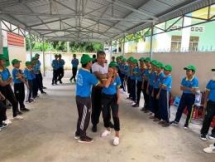 hki vietnam presents over 1300 tom shoes for needy kids in tra vinh